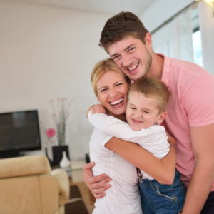 family smiling in their Richmond home